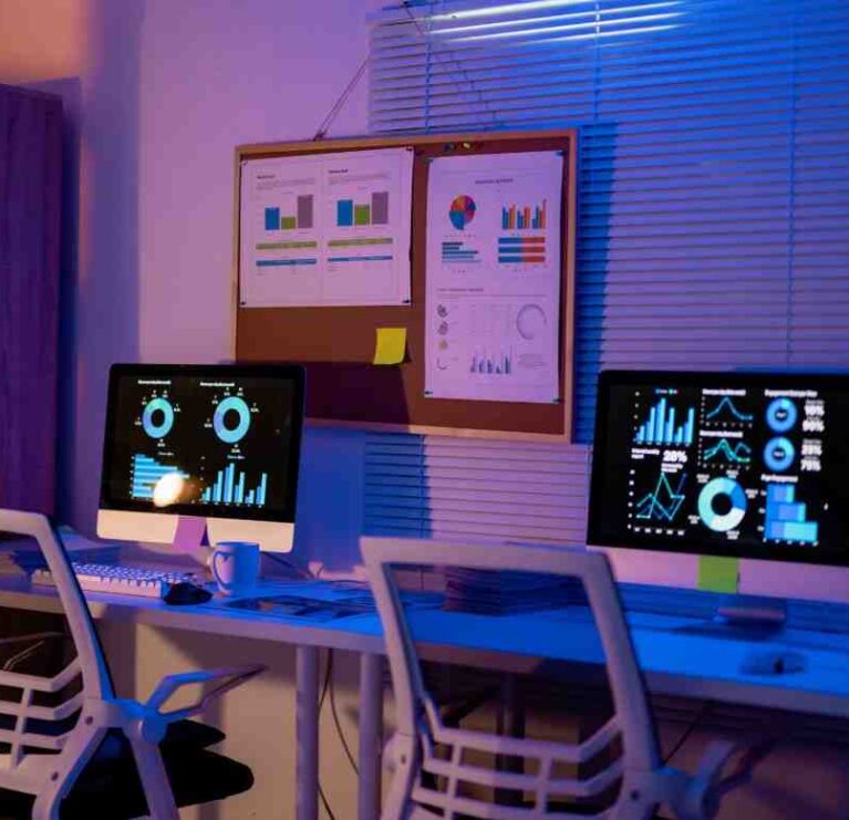 empty-office-desks-displaying-marketing-data-on-co-2026-01-09-11-38-14-utc