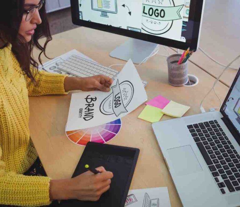 young-graphic-designer-working-at-office-desk-2026-01-09-11-15-34-utc (1)